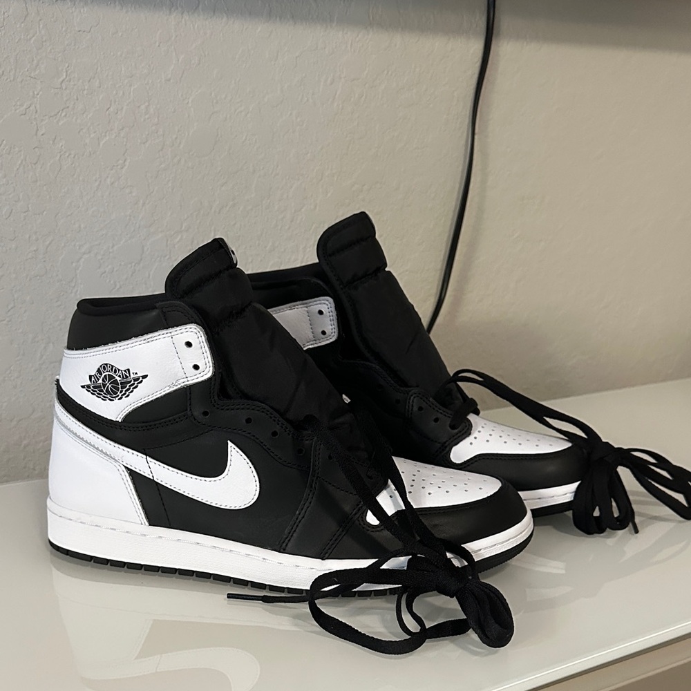 Nike Air Jordan’s Black and White High-Top Sneakers